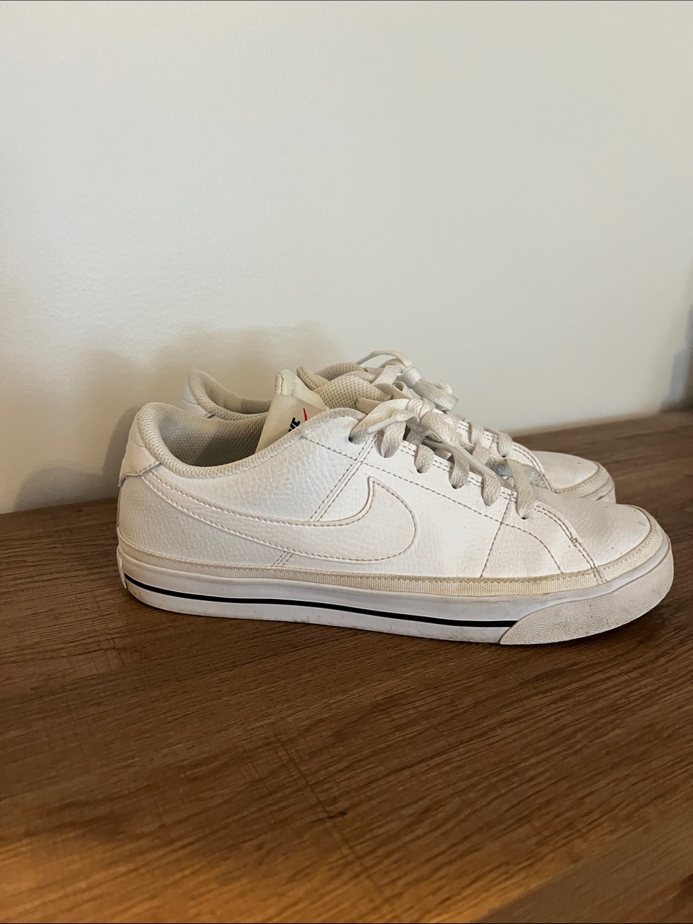 Nike White Low-Top Leather Sneakers with Subtle Swoosh